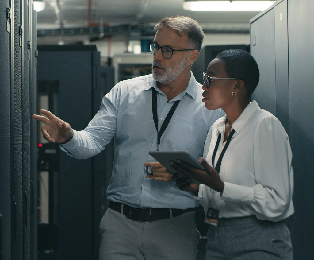 two people discussing computer servers